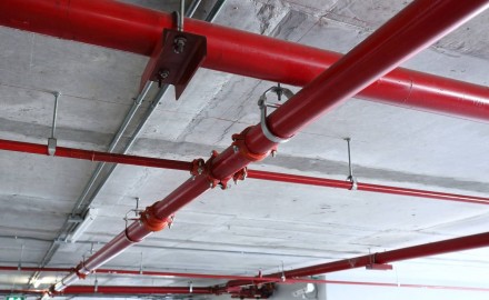 Welded gas and water tubes in an internal car parking